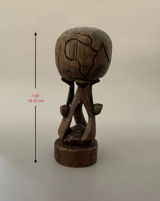 Carved Wooden Globe Sculpture