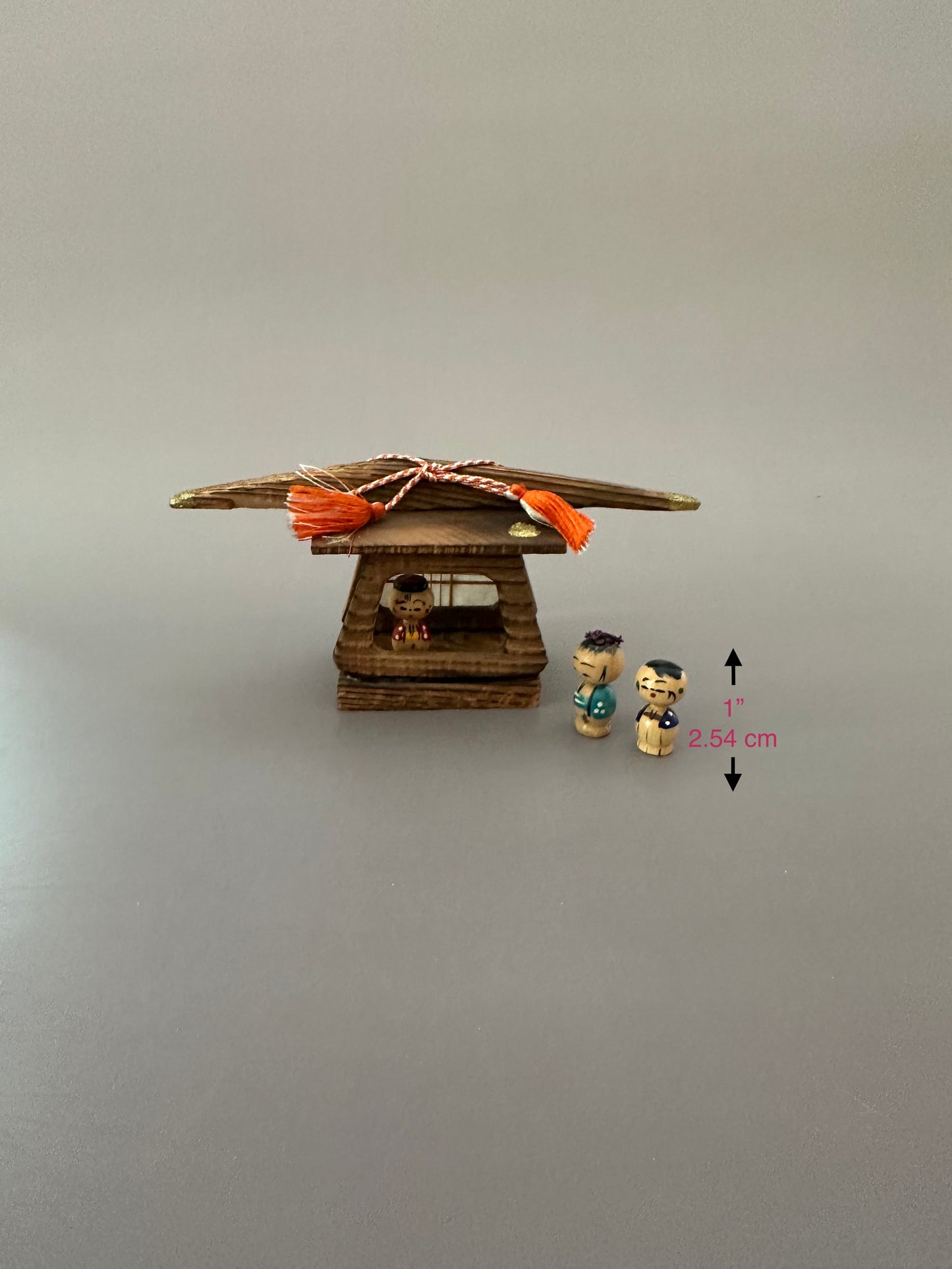 Vintage Wooden Dwelling with Kokeshi Figures