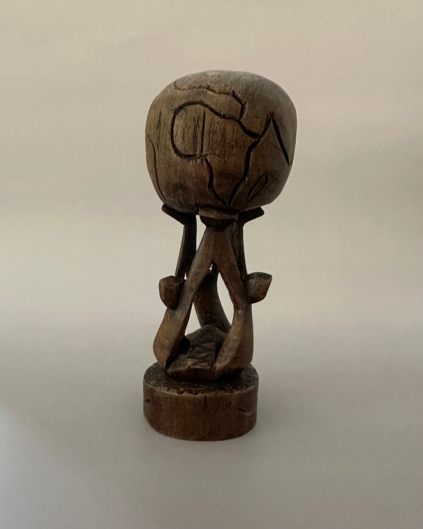 Carved Wooden Globe Sculpture