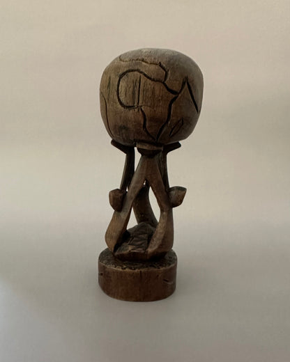 Carved Wooden Globe Sculpture