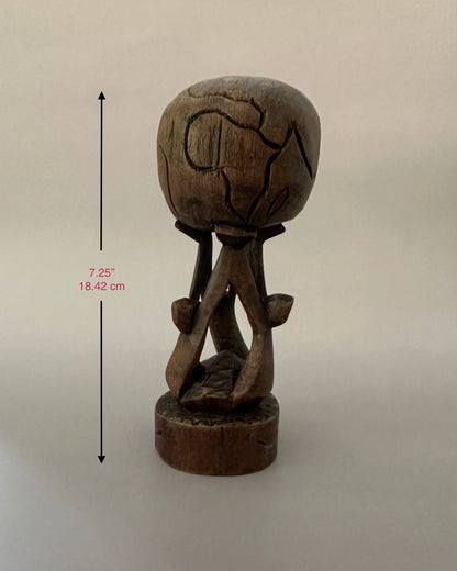 Carved Wooden Globe Sculpture