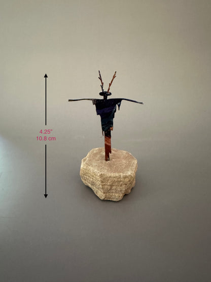 Abstract Metal Figure on Sandstone Base